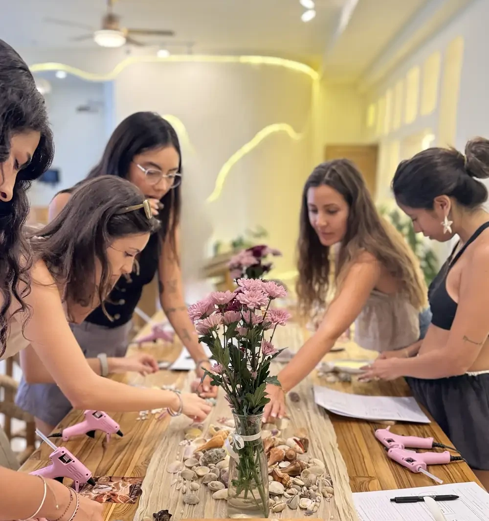 Guests at an indoor craft workshop at Luma Numa in Canggu