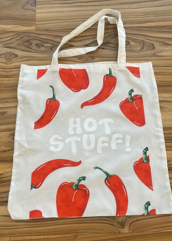 Hand painted canvas tote bag with red peppers made at a Luma Numa workshop